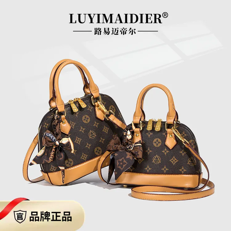 轻奢专柜贝壳包包女年新款洋气百搭ins手提包外出通勤百搭丝巾包