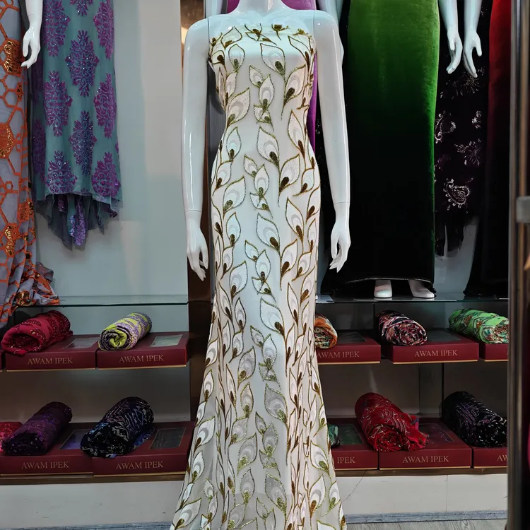 توزگۈل يېڭلق سۇ پەرى  布料