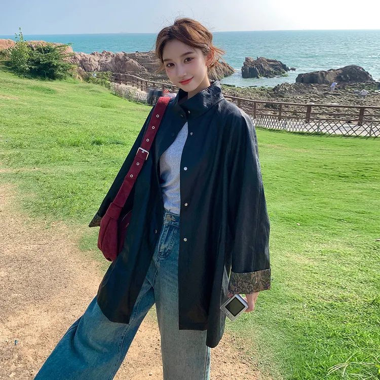 黑色立领皮衣风衣外套女2025秋季新款复古印花拼接宽松中长款大衣