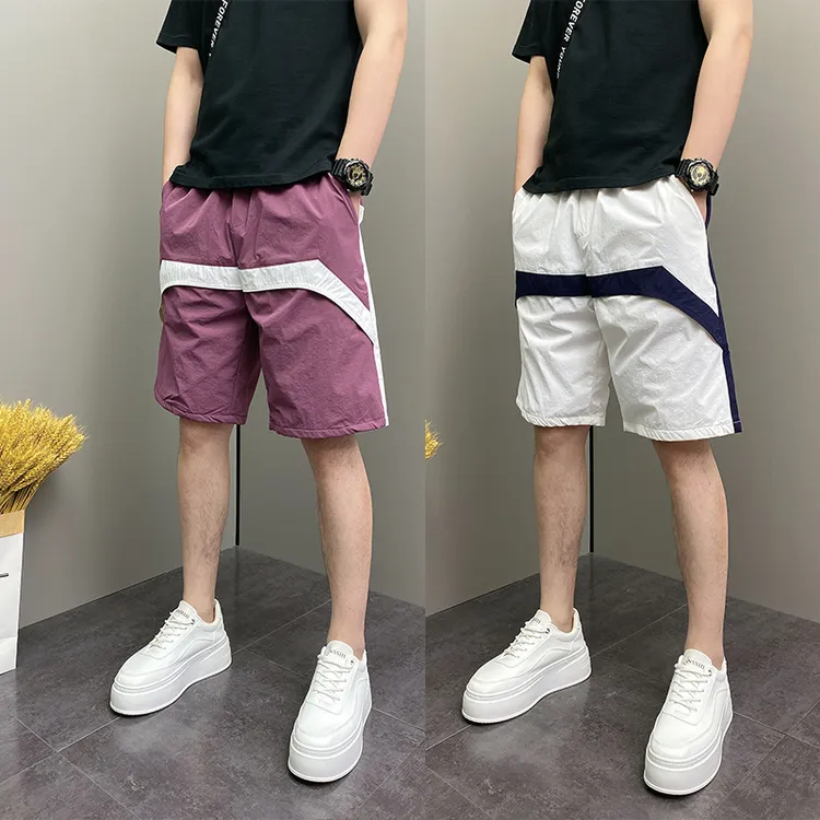 2025年夏季薄款潮流韩版痞帅拼接条纹速干青年男士五分休闲短裤子