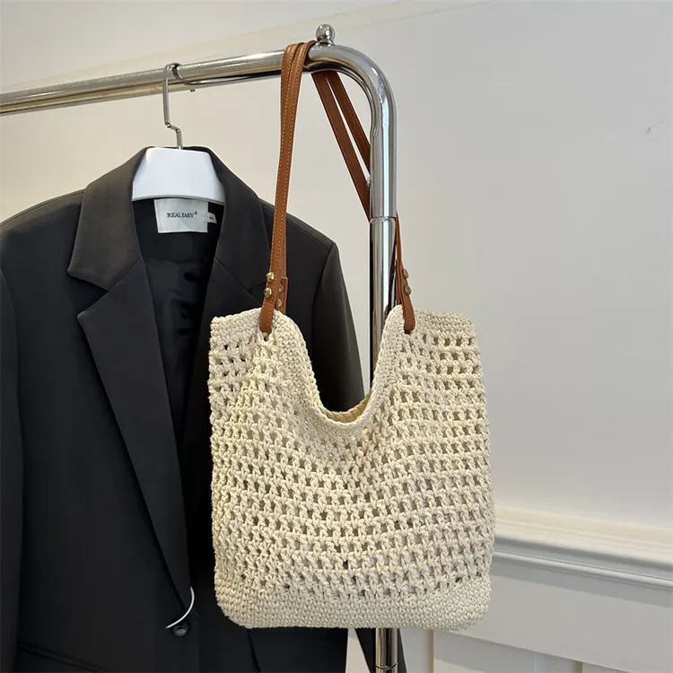 编织唯美单肩海边度假包包女沙滩包大容量新款草编通勤网格针织