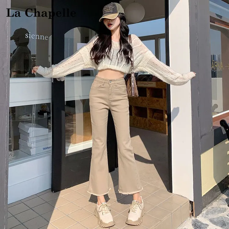 拉夏贝尔奶茶色微喇牛仔裤女2025早秋新款显瘦百搭毛边裤脚喇叭裤