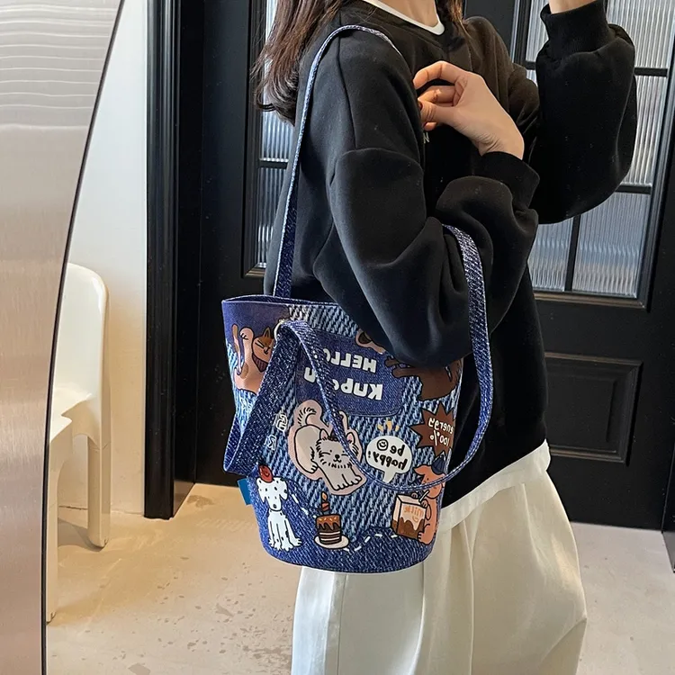 水桶包时尚复古斜挎单肩包女年春季水桶包车缝大容量百搭通勤轻便