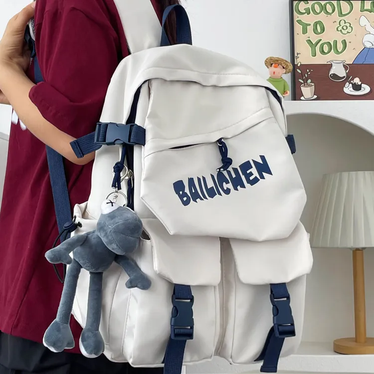 书包初中生高中生双肩包简约大容量大学生轻便百搭背包