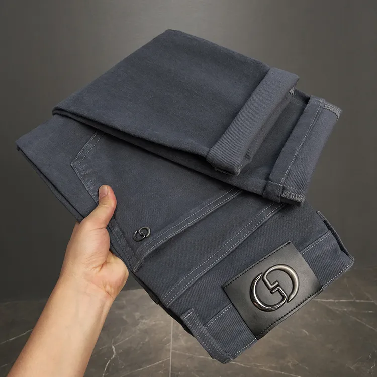 高端轻奢男士九分牛仔裤秋冬新款欧洲站修身弹力小直筒休闲男长裤