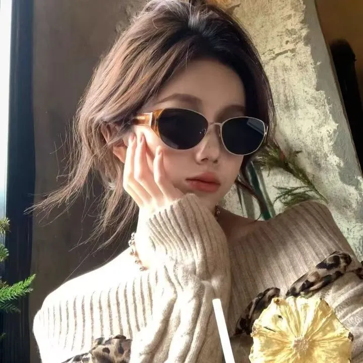 【薯薯镜】海伦凯勒新款猫眼圆框潮流太阳镜百搭俏皮墨镜女HK909