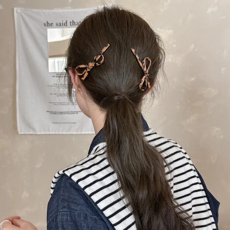 皮质蝴蝶结侧边夹发夹女高端一字发卡2025新款碎发刘海夹前额发饰