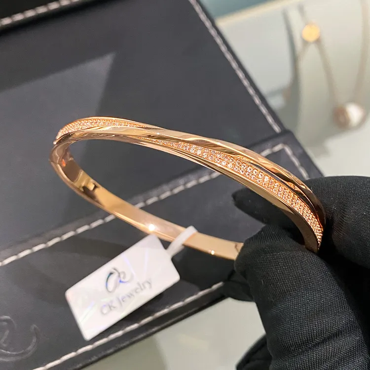 CK 钛钢合成锆石手镯 莫比乌斯旋钮双排钻卡扣女生手镯高级感手环