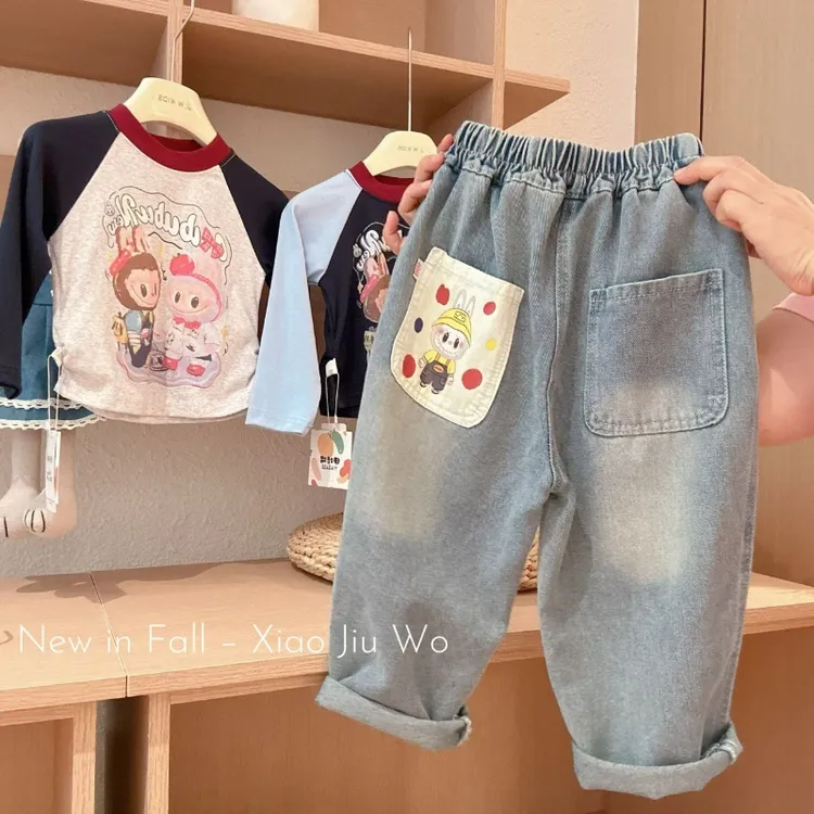 新款卡通印花童装春秋牛仔裤2025新款儿童宽松洋气裤子男女童裤子