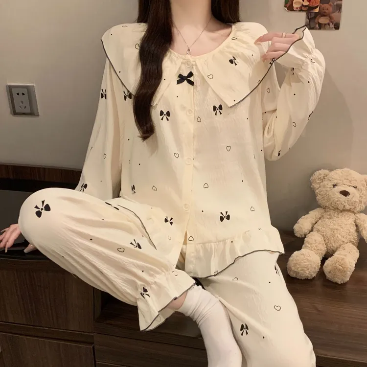芯语婷秋季新款带胸垫娃娃领黑色蝴蝶结云朵棉女睡衣高级气质套装