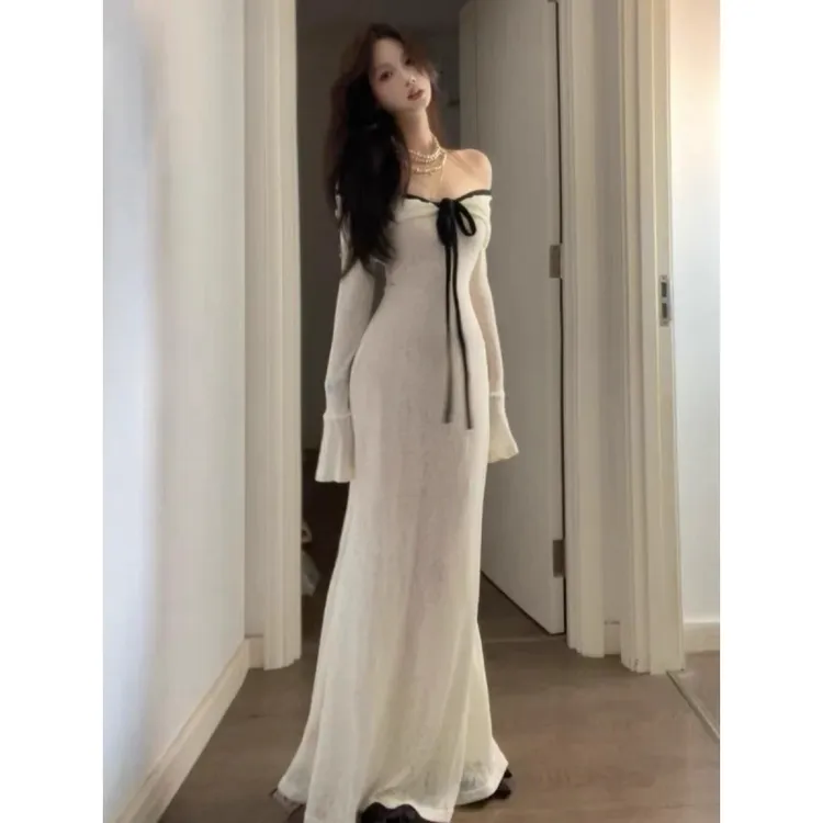 巨好看一字肩高级连衣裙子冬季女装2025新款法式气质修身长裙穿搭