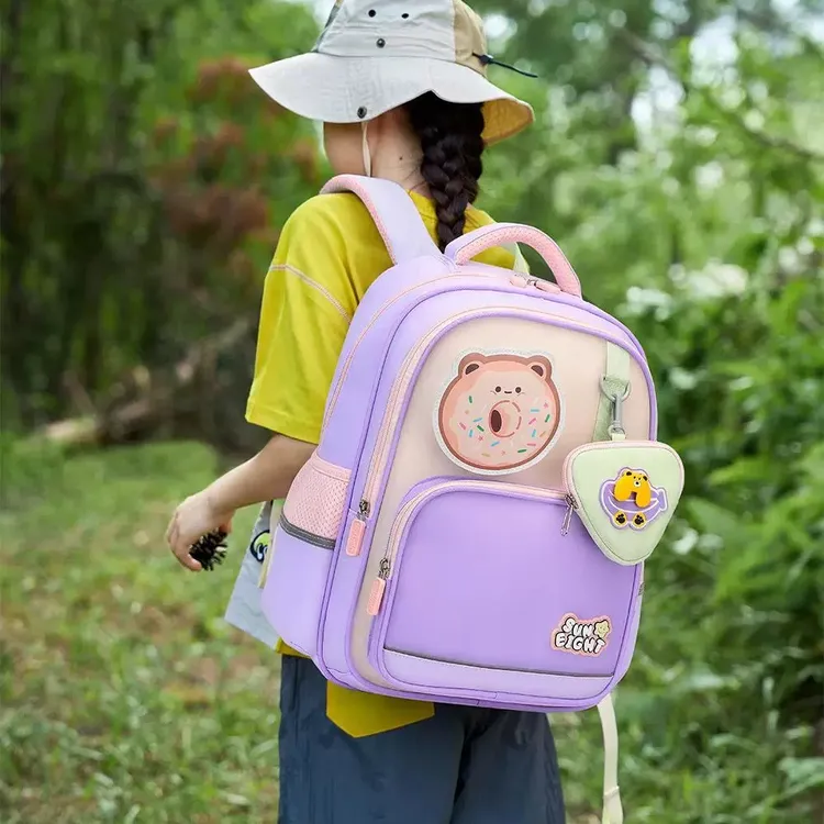 正品阳光8点轻便减负护脊适合1 - 3年级的可爱卡通防水双肩书包