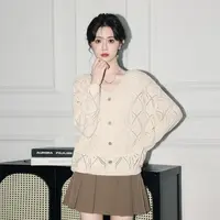 杏色V领长袖针织衫女春秋2025秋新款宽松设计感镂空外搭薄款上衣
