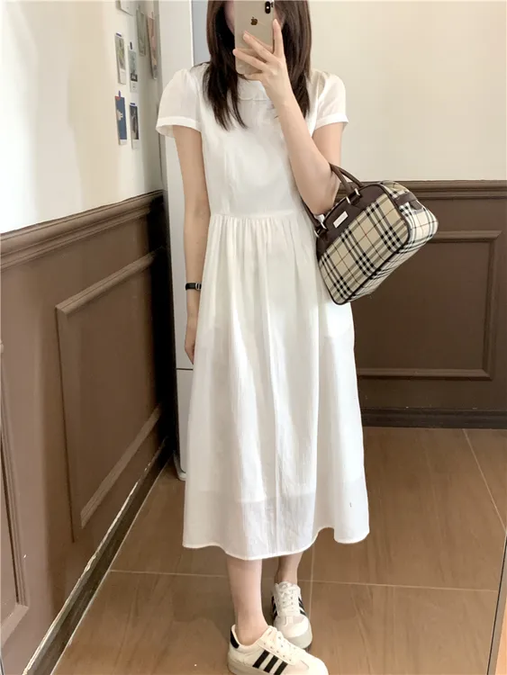 极简风气质小清新温柔圆领连衣裙女装2025夏季新款高级a字小白裙