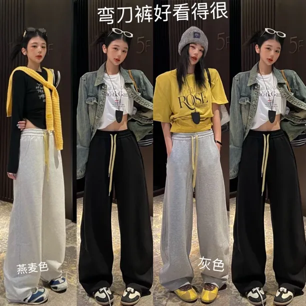 六六新款秋款显瘦拼色弯刀裤休闲裤313