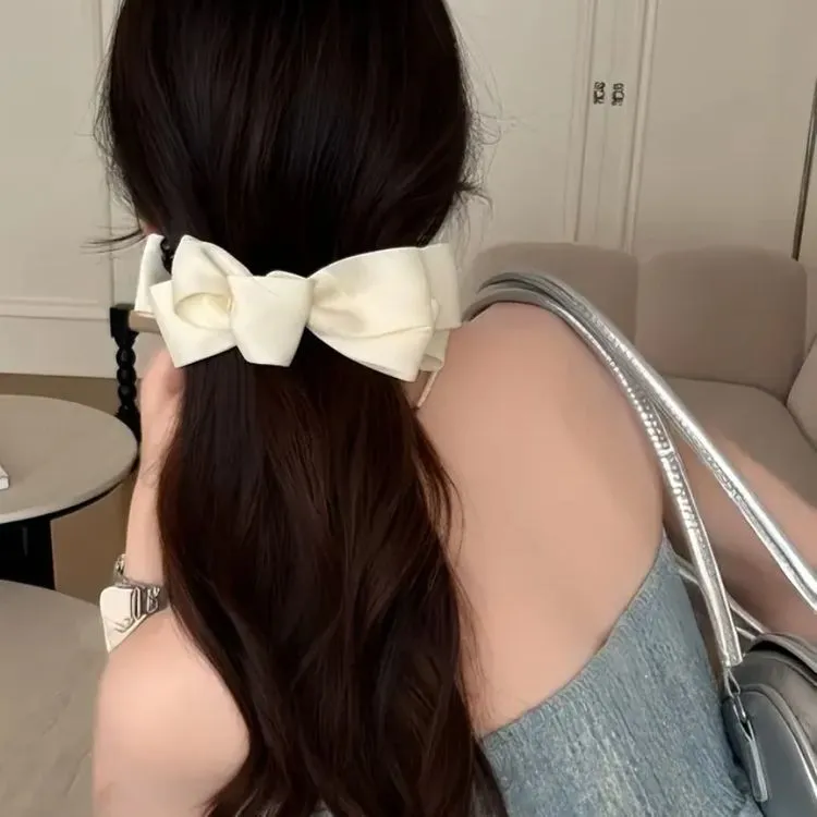 粉色洋装～韩国设计款多层缎面蝴蝶结香蕉 夹甜美后脑勺高马尾夹