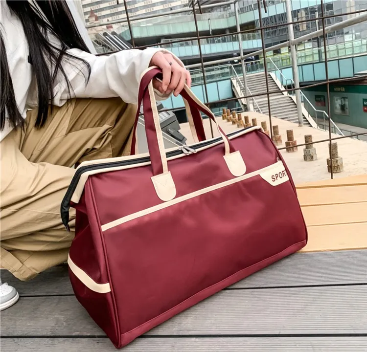 W旅行包男女同款登机出差包便携包休闲大容量收纳包行李袋旅行包