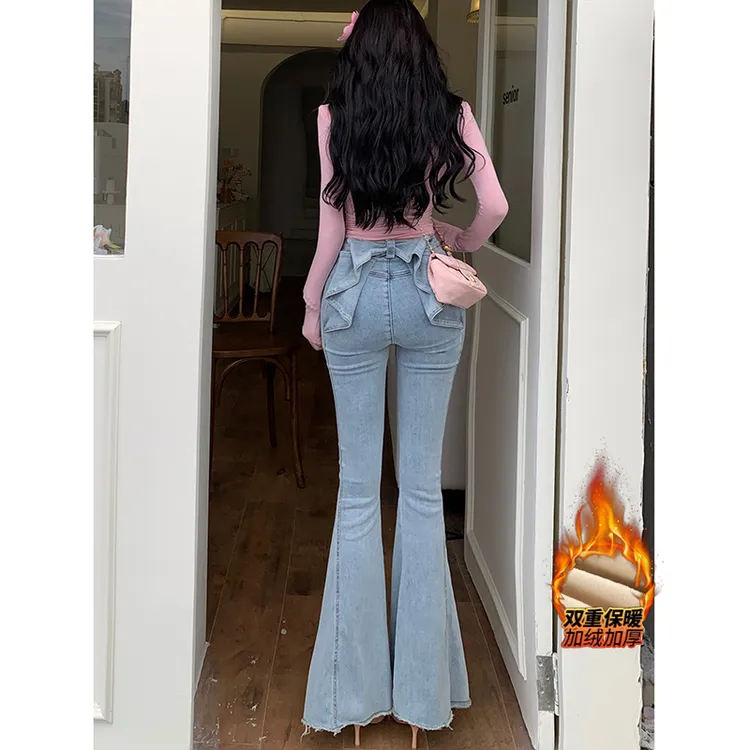 亦菲同款立体蝴蝶结牛仔裤女2025冬款加绒欧若风高腰翘臀喇叭长裤