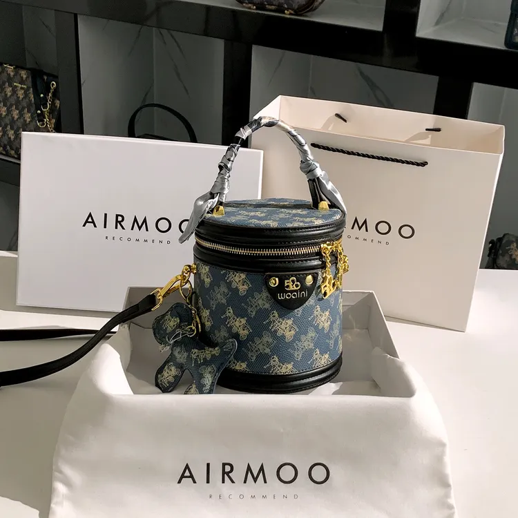 AIRMOO/艾姆轻奢包包女士小众手提小包时尚百搭斜挎包单肩水桶包
