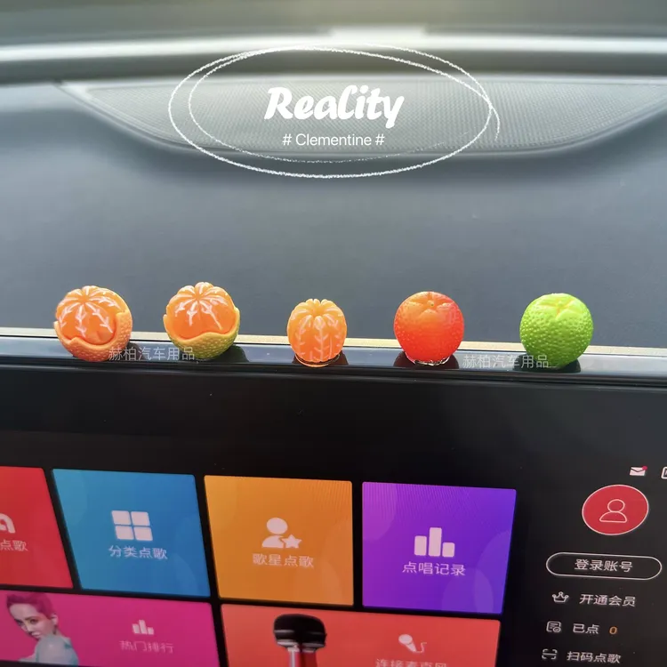 网红汽车摆件2025新款创意可爱迷你橘子中控台电动车女生车内装饰