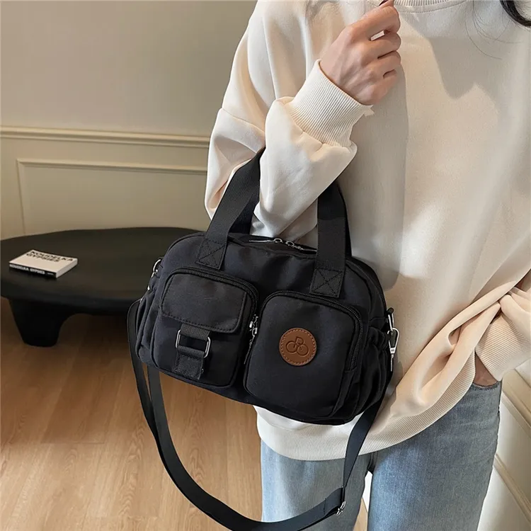 休闲手拎包包女式2024年冬季轻便布包单肩包大容量上课通勤斜挎包