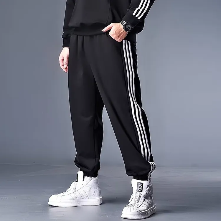加肥加大秋冬季运动裤男大码束脚休闲裤潮胖子宽松卫裤三条扛裤子