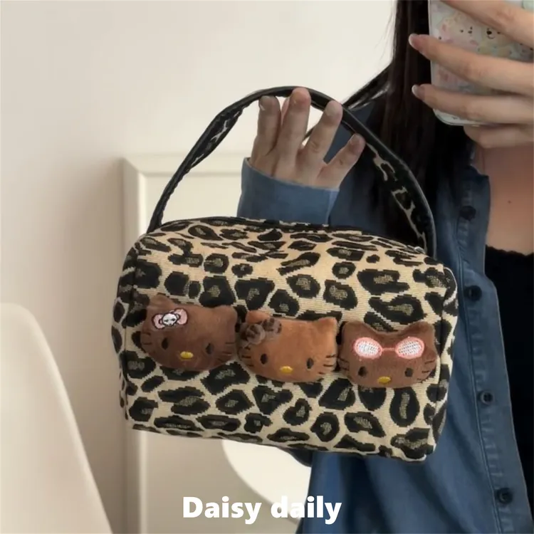 黑皮豹纹kt猫新款大容量手提包化妆包便携洗漱收纳包旅行帆布包