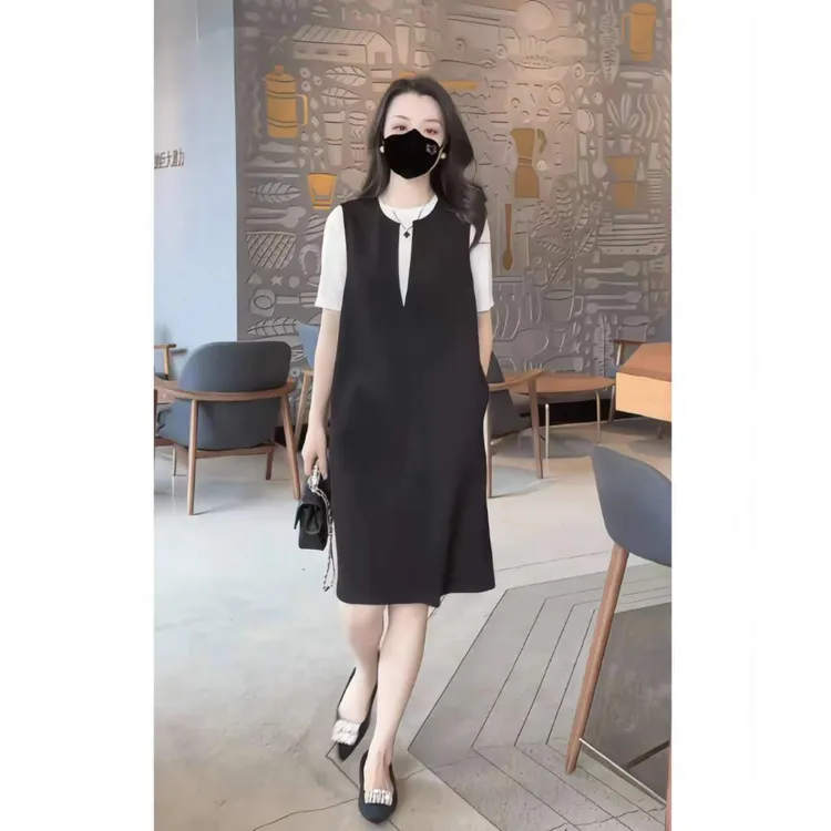 简约时尚黑色背心裙女2025春秋新款宽松显瘦遮肚子中长款百搭裙子