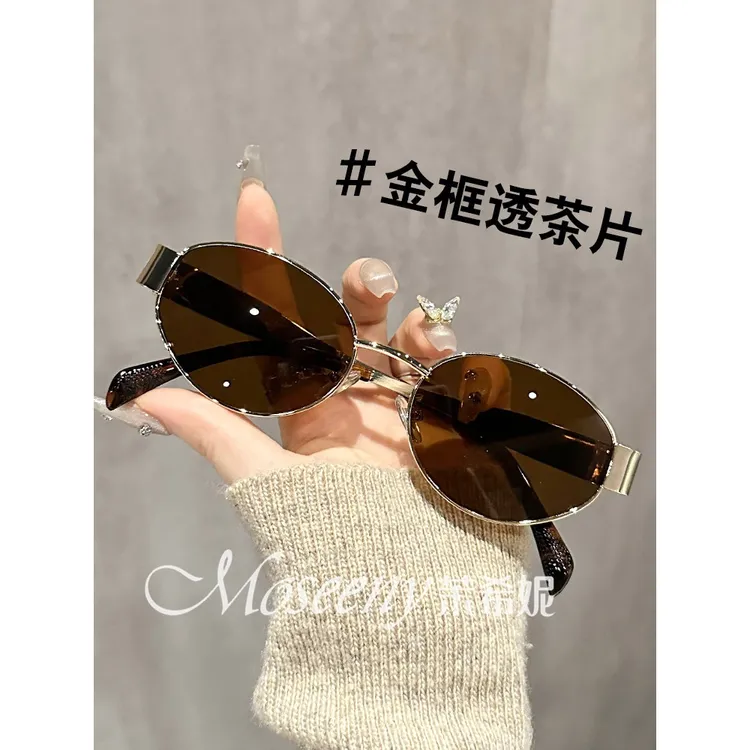 复古港风时尚墨镜女高级感金属风椭圆形街拍太阳眼镜防紫外线开车商品图