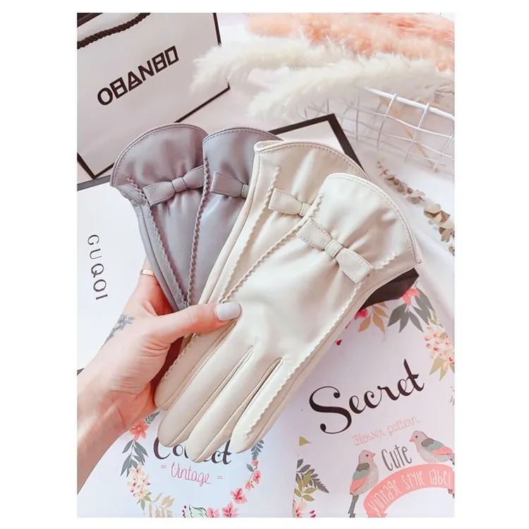 羊皮手套女冬触屏秋冬季韩版可爱蝴蝶结加绒保暖防寒开车机车真皮