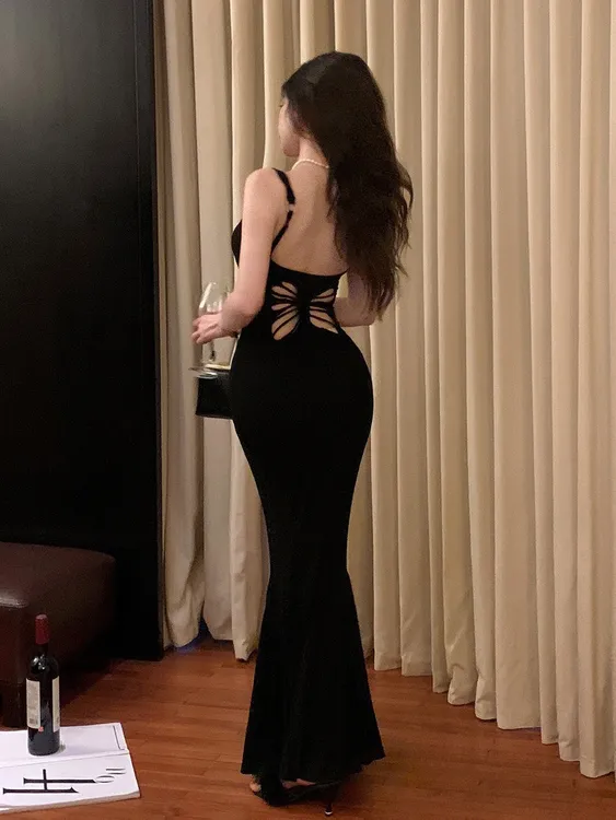 美神妲己中长款法式蝴蝶辣妹夏季吊带连衣裙女夏修身包臀黑色长裙