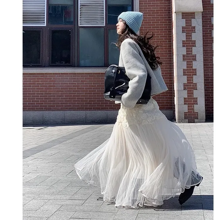 0273杏色加绒半身裙女秋冬中长款不规则伞裙设计感小众重工网纱裙