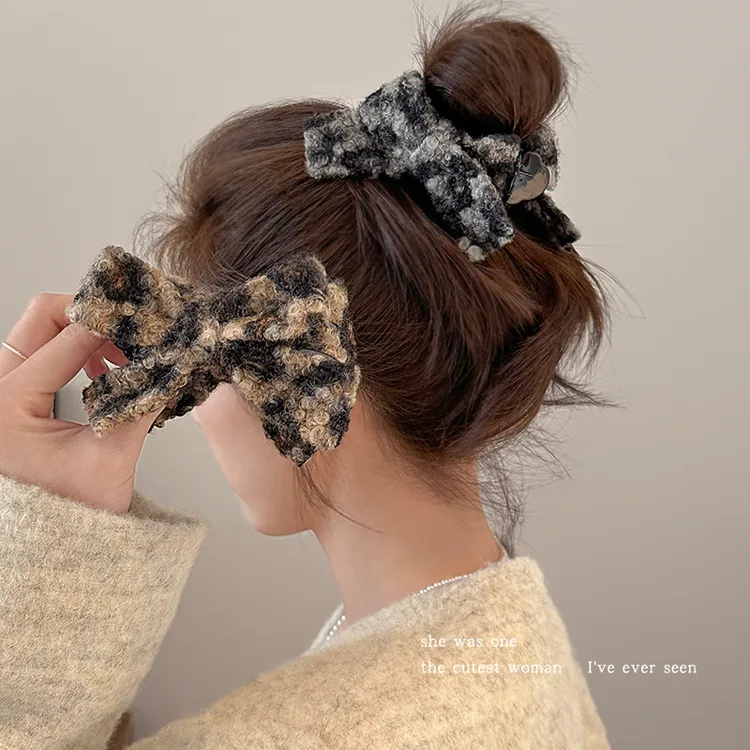 毛绒豹纹蝴蝶结丸子头抓夹女气质盘发鲨鱼夹子马尾发夹高级感头饰