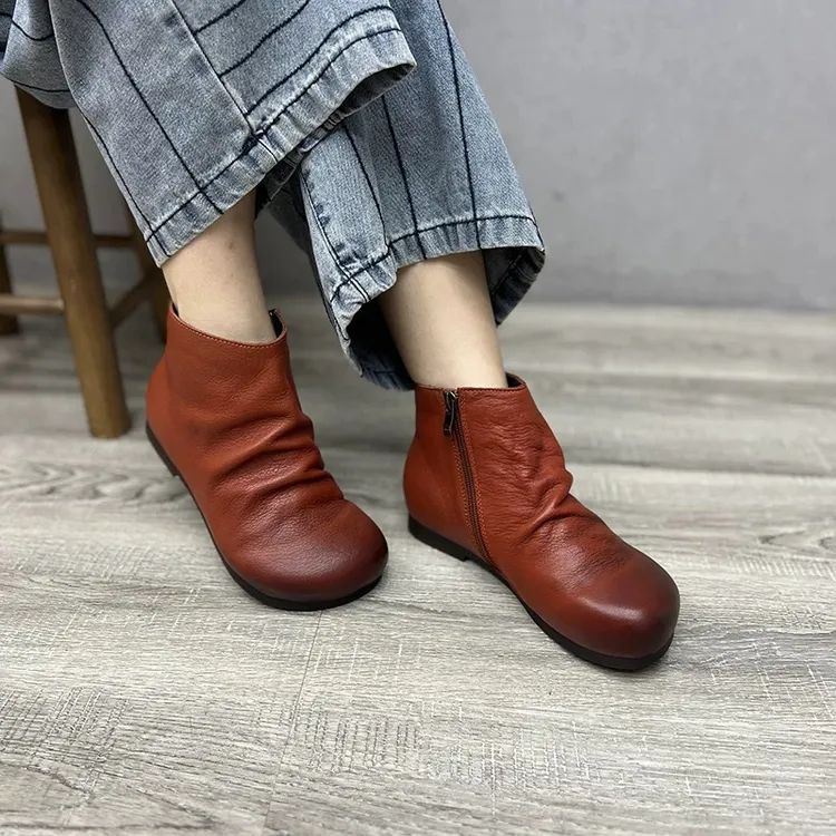 艺鞜2025冬季新款真皮保暖二棉妈妈平底褶皱瘦瘦靴加绒复古短靴子