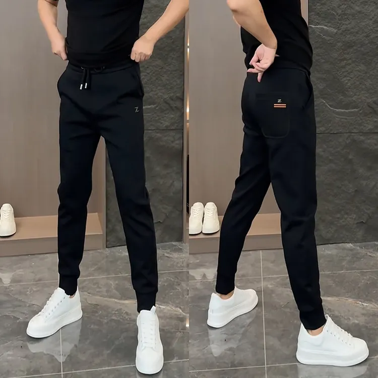 秋冬新款运动卫裤男士潮流百搭修身休闲裤网红同款束脚弹力哈伦裤