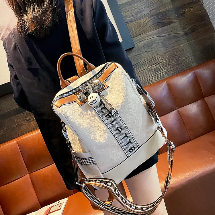 高级感真皮双肩包女2025新款烫钻双肩包大容量旅行背包两用女包包