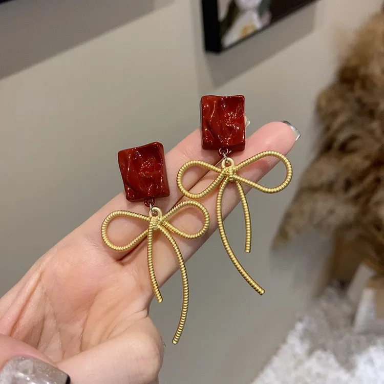 安可拉红不规则蝴蝶结长款流苏耳环个性显瘦夸张耳钉时尚气质耳饰