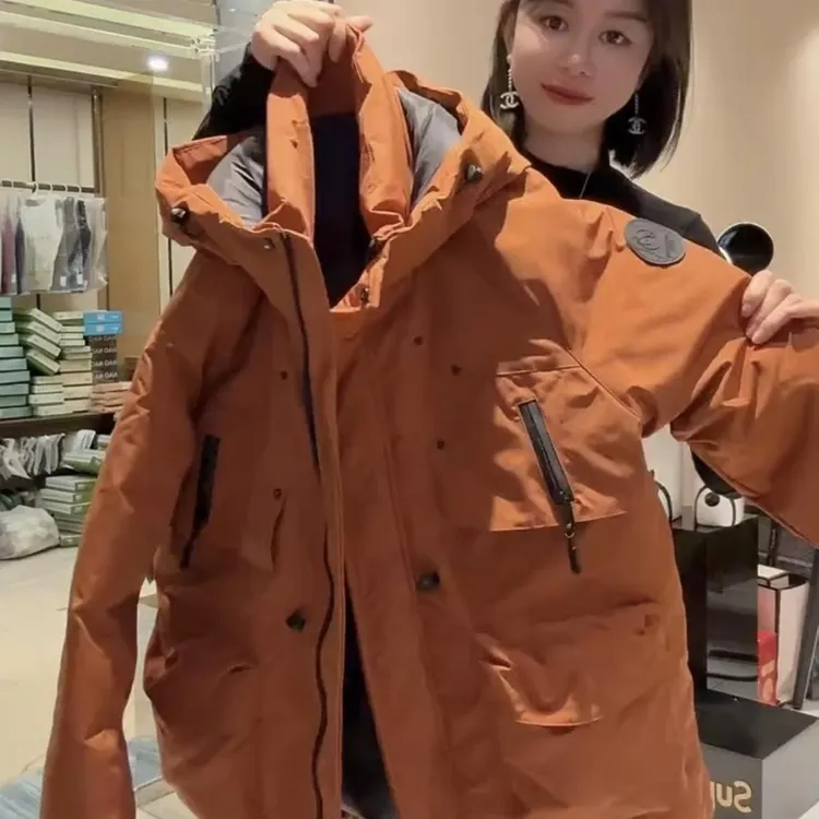 2025冬季时尚宽松连帽收腰中长款贴标加厚派克服百搭休闲棉服女