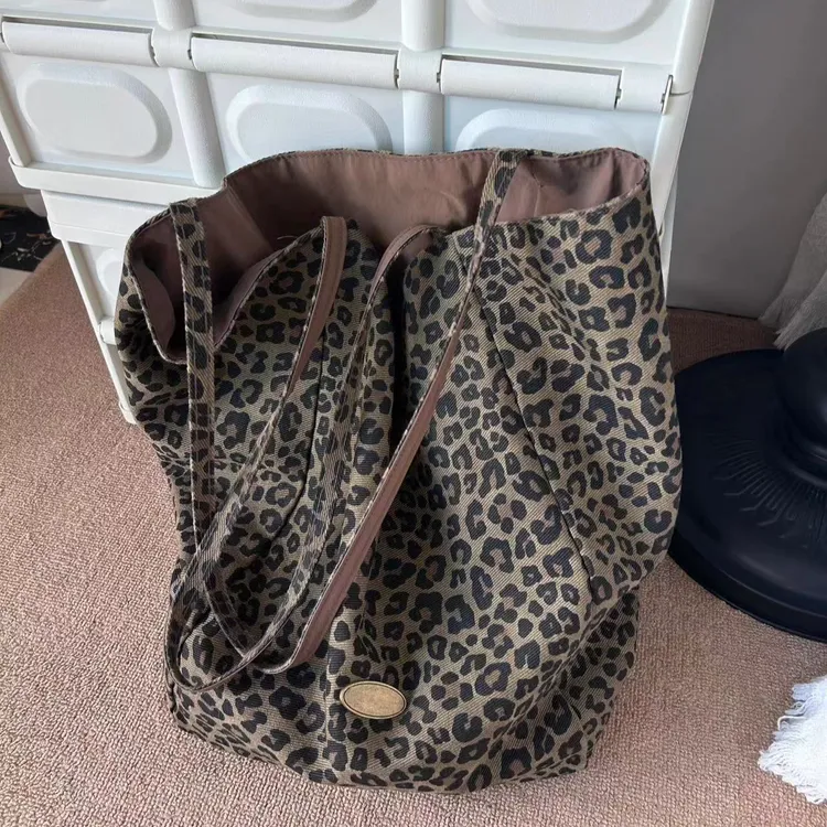 通勤豹纹帆布包包女2025秋季新款时尚学院风托特包休闲大容量布包