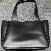 姝宴真皮女包黑色佳桶