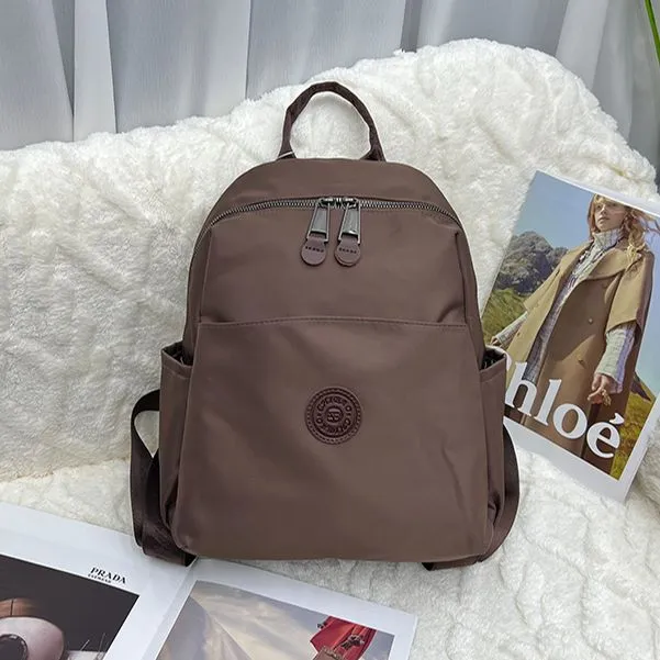 女士双肩包轻便休闲大容量旅行包防泼水牛津布包简约百搭背包1685