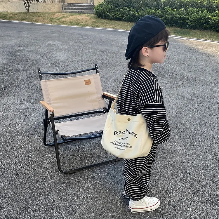 大容量儿童包包潮酷男童宝宝斜挎包幼儿园小男孩洋气配饰帆布包