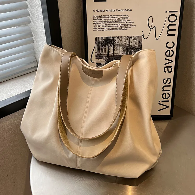 大容量通勤帆布包包女2024新款休闲单肩包夏季百搭学生上课托特包
