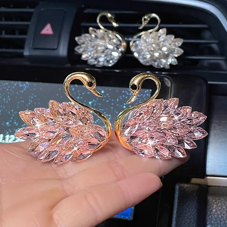 新款车载空调出风口香薰汽车淡香高档天鹅车内装饰品摆件香水女士