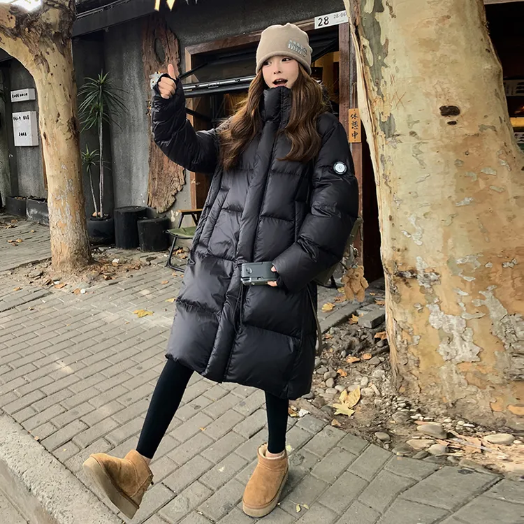 黑金鹅绒羽绒服女中长款2025冬季新款宽松加厚白鹅绒连帽可背外套