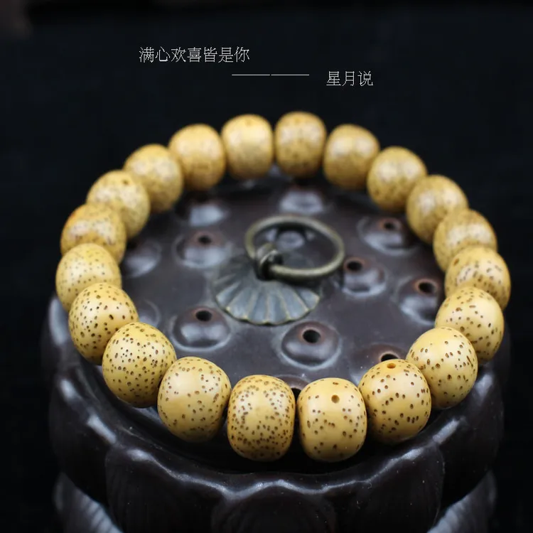 陵固思星月菩提手串老籽桶珠圆珠海南料鸡油黄