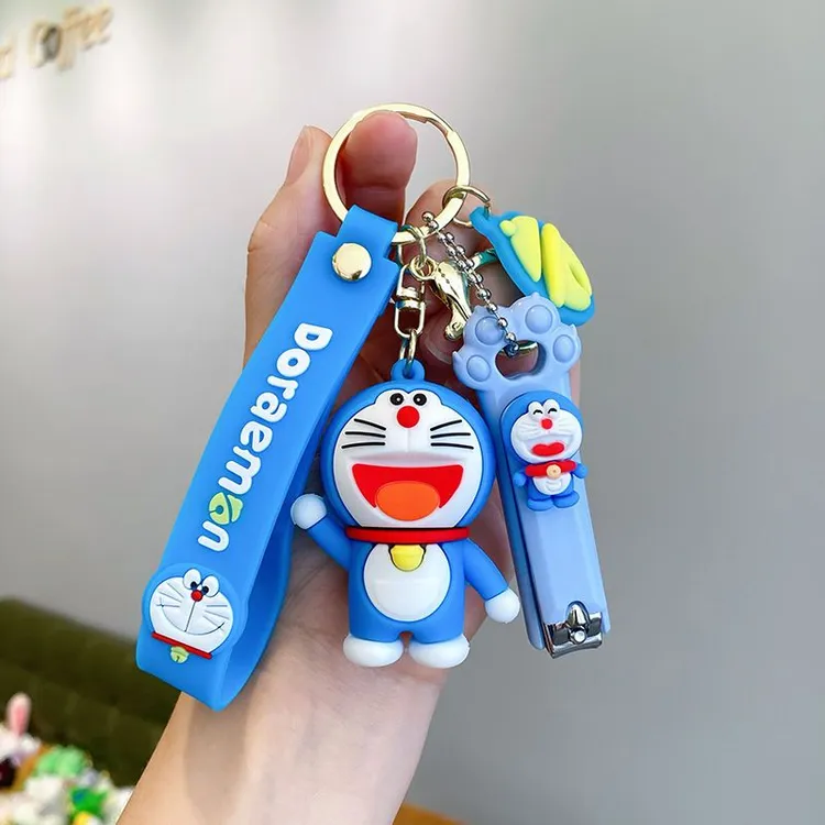 创意可爱叮当猫公仔汽车钥匙扣卡通皮绳铃铛钥匙链圈包包挂件女