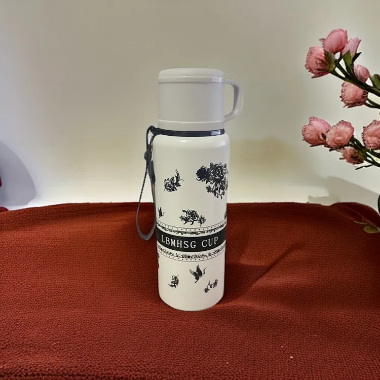 高颜值600ML栀子花保温杯字母随机带喝水小盖金属罐按压扣保冷