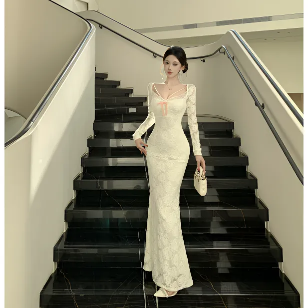法式纯欲风小众蝴蝶结V领连衣裙气质性感春秋款修身显瘦鱼尾长裙