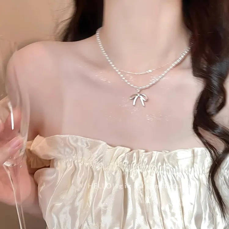 合金项链 蝴蝶结小米珠项链女款2025新款轻奢小众配饰锁骨链颈链